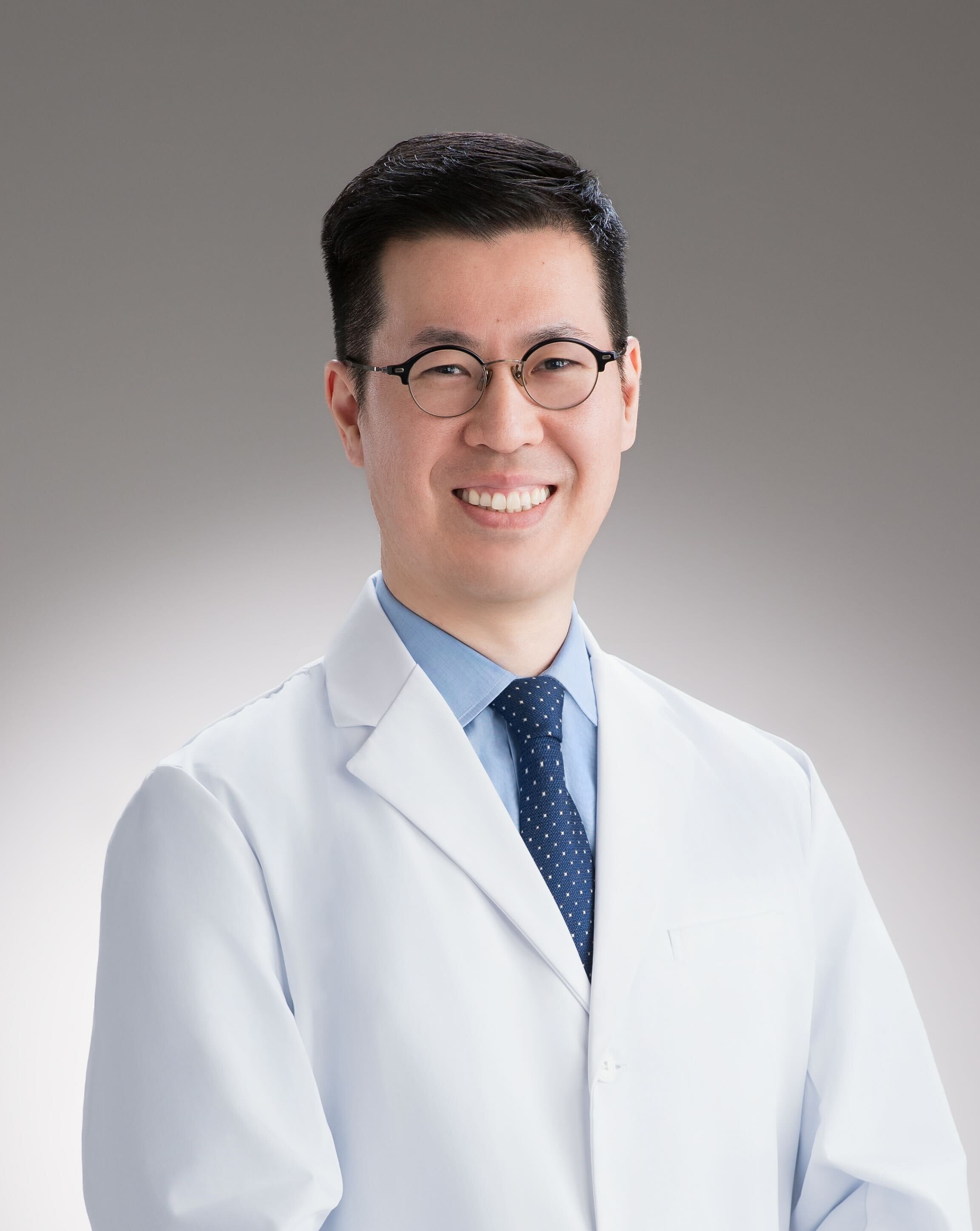 歯科医師　須永　健一